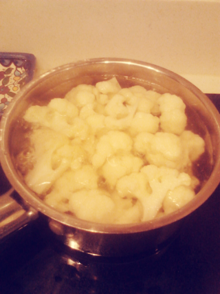 Cauliflower Cooking on Stove